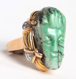 Maya Apple-Green Jade Ring, 14k Gold Band: Pre-Columbian, Maya territories, probably Guatemala Maya Classic period 250-900 CE. Maya stone apple green imperial jade miniature maskette. Drilled to the corners and base for suspension on a