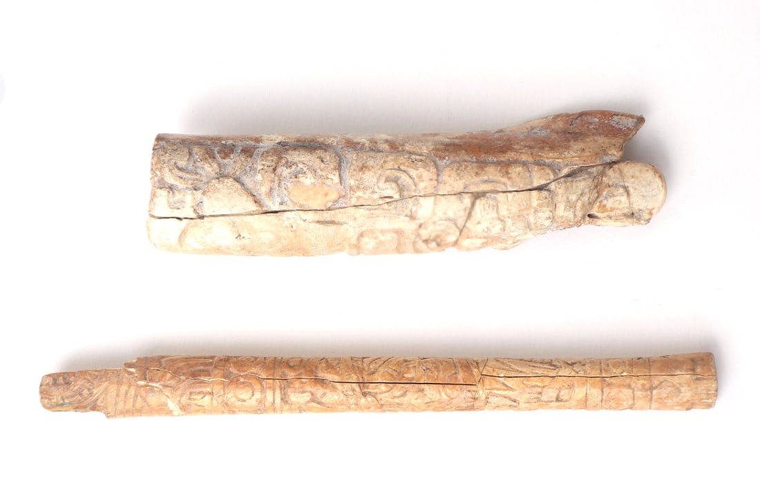 Chavin Bone Incised Implements, 1968 Provenance: Peru, Cupisnique, Middle Phase, North Coast, circa 1200 - 800 BC. Well rendered incised carved fragments. One is a thin tubular honey color implement carved delicately all around with complex iconogra