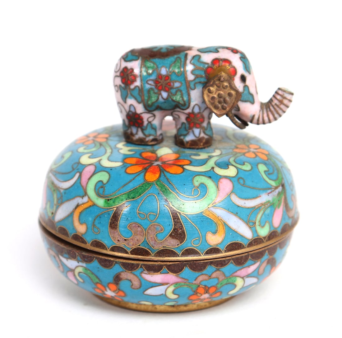 Chinese Cloisonne Elephant Music Box: Vintage Chinese cloisonne music box with elephant finial. Bright blue background with orange, pink, green and white details throughout. Copper wiring border each flower and leaf in intricate detail. R
