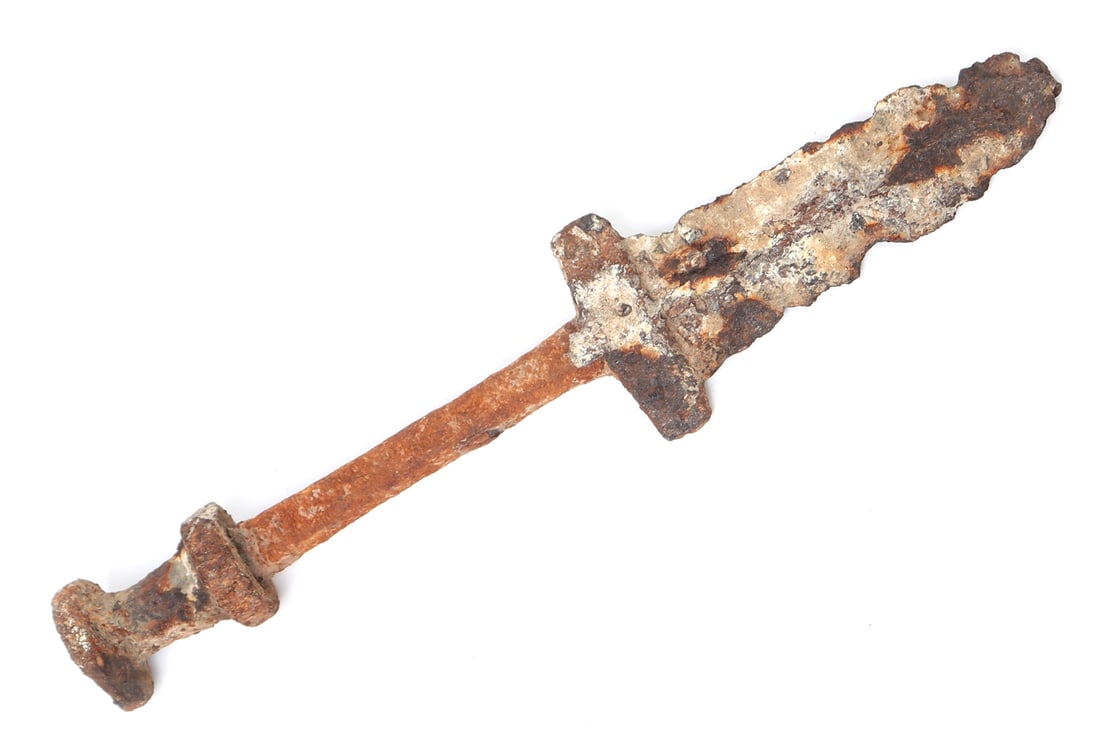 Excavated Roman Pugio Fragment: Early excavated Roman Pugio sword fragment with pommel attached and with a rectangular crossguard and double edged blade having a central raised medial ridge. Roman daggers, often referred to as "pugi