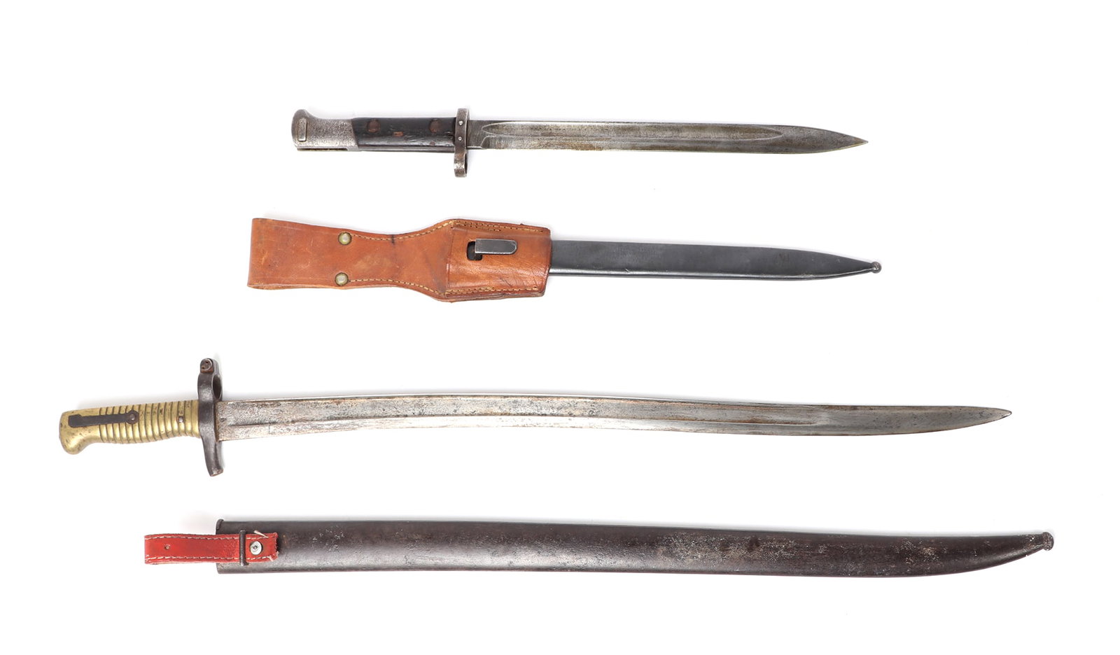 Two Bayonets w/ Scabbards: Two antique bayonets, the largest is a 28" L French bayonet with scabbard and a 21" blade, the smaller is German k98 or Czech produced given the hallmark of a circled (Z).