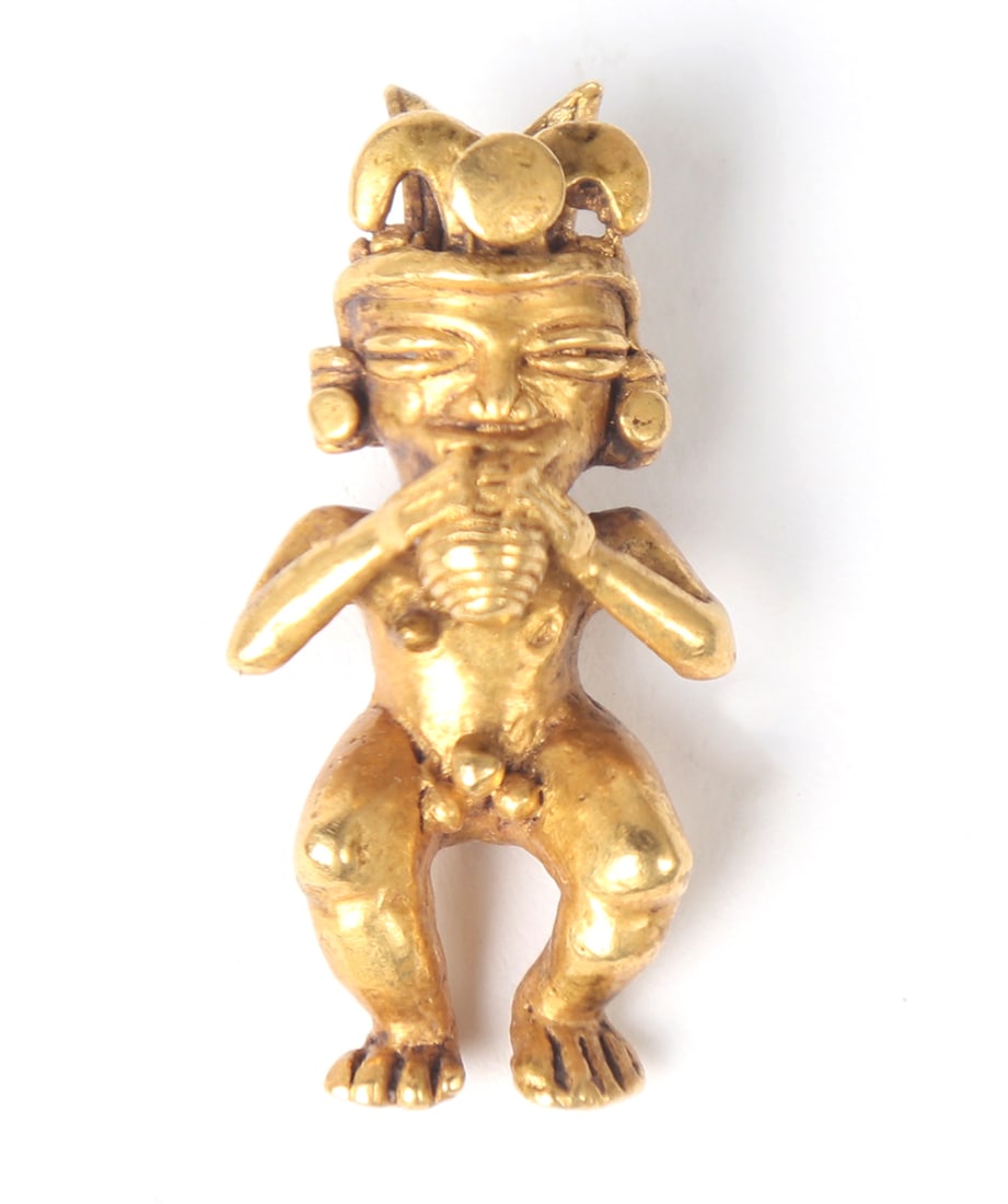 Pre-Columbian Sinu Gold Male Maize Pendant, 41.8 grams 22-24kt: Fine gold figure of a male lord eating maize with an elaborate crown and pierced to the back for suspension. Size 1 1/2" H The Sinu culture indigenous civilization to Caribbean coast of what is now mo