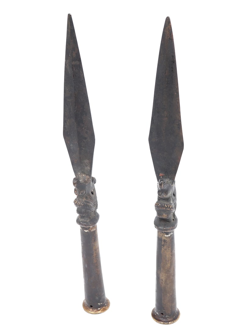 Two Chinese Spear Heads: Group of two Chinese spear heads in the Qing Dynasty style with socketed bases and dragon heads that have their mouths open to the blade an elongated form and double edged. Size 18" H