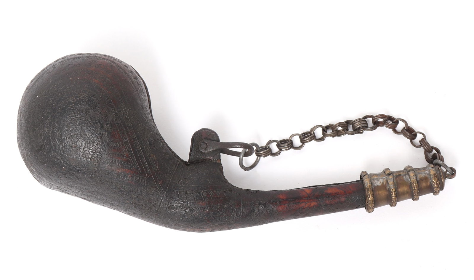 Middle Eastern Powder Horn w/Copper Cover: Finely detailed Afghani powder horn with floral and geometric detailing throughout, covered in a thick patina. The powder horn also has a metal chain leading to a copper cover with circular detailed t