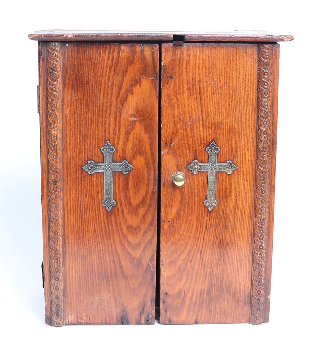 20th Century Viaticum Cabinet: Constructed with ornate details to each side and intricately detailed crosses on the front of each door. Also known as an alter cabinet it was used as a Last Rites in the Catholic church and contained