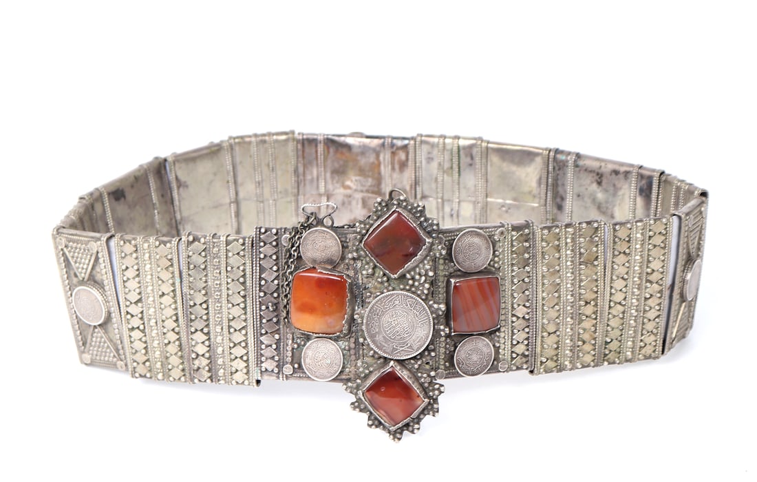 Impressive Complete Silver Bedouin Peoples Belt: Four marbled red carnelian cabochons, surrounded by beaded silver work throughout. Fifteen riyal coins from Saudi Arabia are applied throughout, with more marvelous carnelian cabochons. Each panel is 