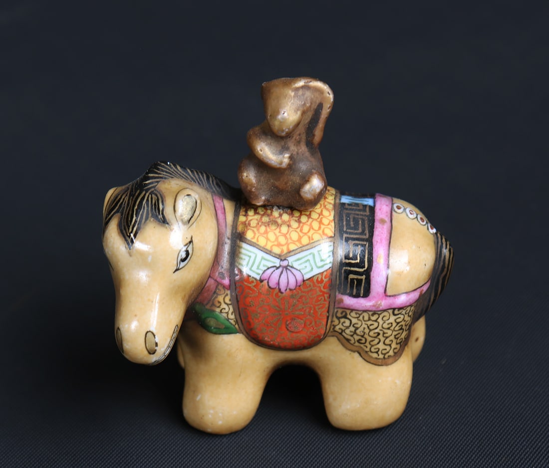 'Horse and Monkey' Enamel Snuff Bottle: Beautiful hand painted snuff bottle with monkey in pose atop a horse. Their compatibility referenced in the zodiac this snuff bottle shows their compatibility and full energy with four character seal 