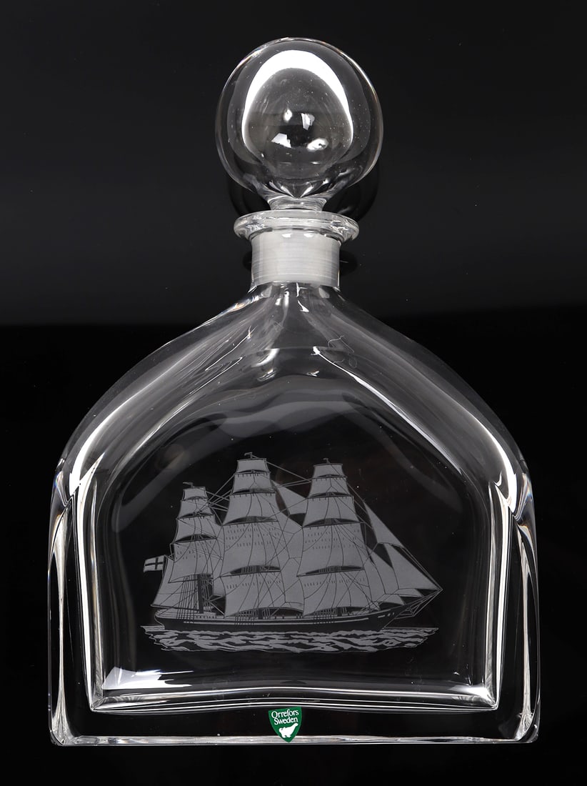 Orrefors Sweden Crystal Decanter, Sea Cloud: Gorgeous crystal decanter etched to the front with a Sea Cloud cruise ship. The etching is external and the texture can be felt throughout. Original Orrefors Sweden sticker to the reverse near the bas