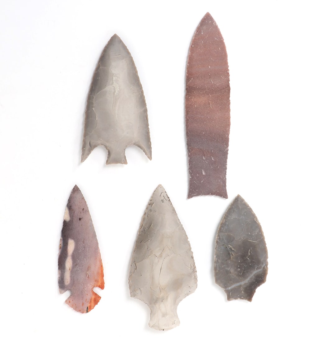 Group Lot of Five Stone Points: Collection of five unusual stone points including one elongated example with a red color and several with tails. Size largest 5" L Ex-California Collection