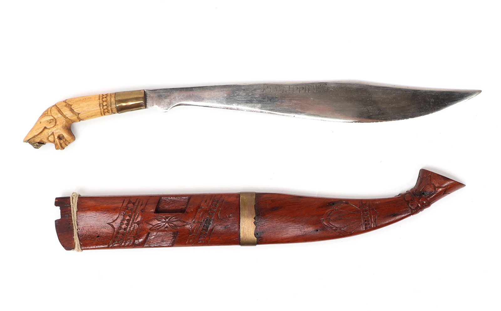 Philippines Bicol w/ White Bat Handle: Southeast Asia, Philippines archipelagos. Bicol bat head style handle and pommel circa WWII-period. Single edged blade in high polished steel with commemorative Philippines engraved to the top of the 