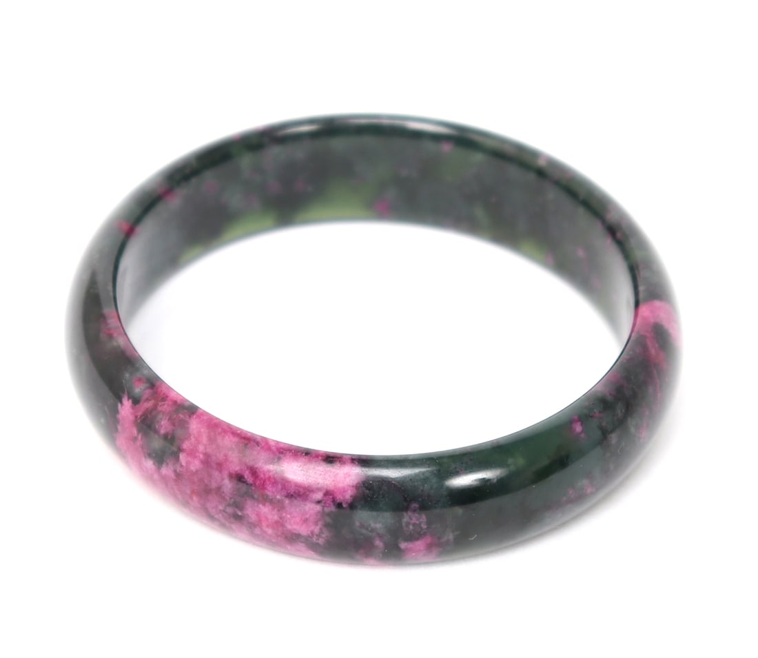 Gorgeous Rhodonite Crystal Bangle Bracelet: Deep forest green against bright sunrise pink marbling make for an absolute stunning rhodonite crystal bracelet. Light in hand but very sturdy. Size 2 3/4" W