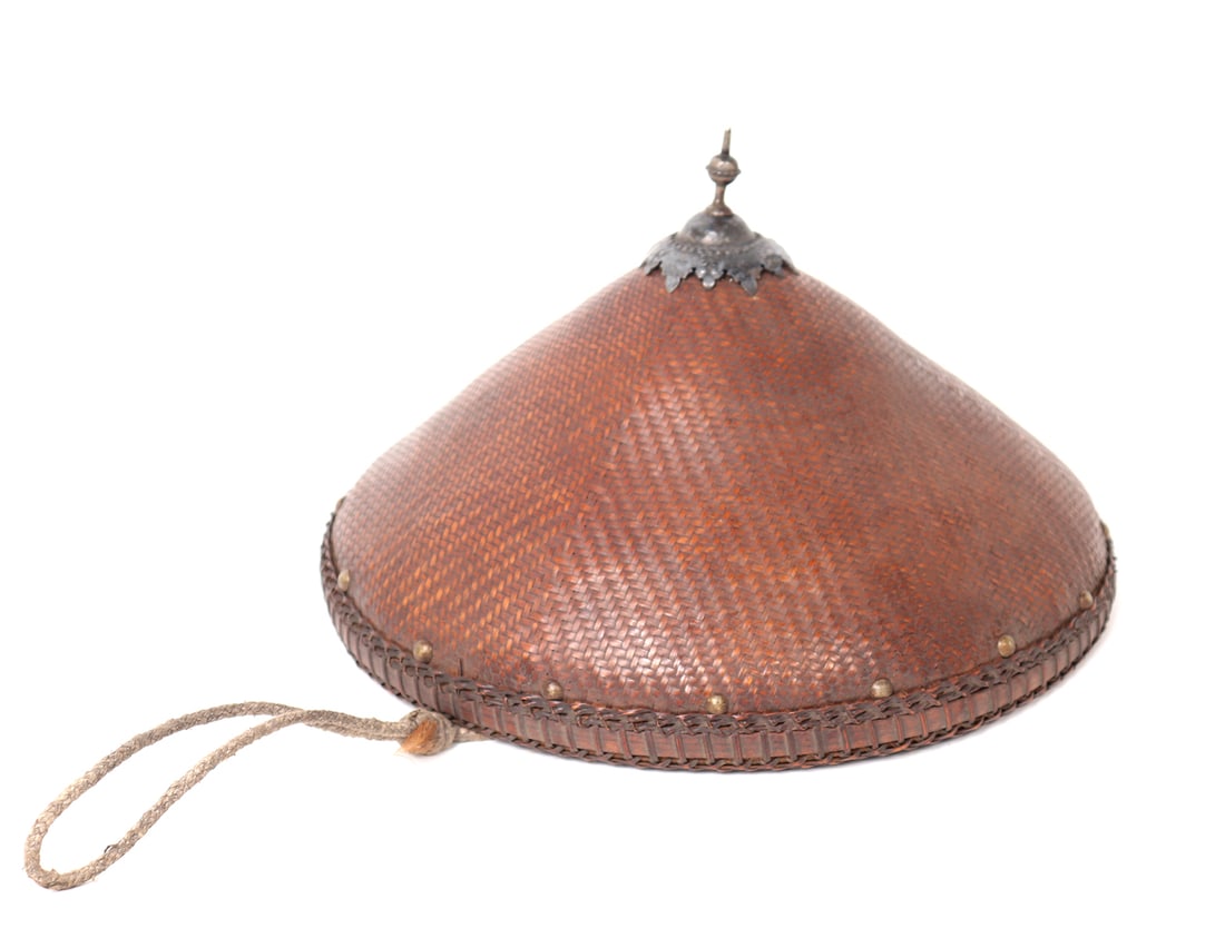 Antique Metal Decorated Filipino Salakot: Beautiful cane woven salakot, which translates to native hat, hand made in the Philippines. Brass bead appliques surround the rim, with a metal hammered cap, with a dome leading to a metal ball and ti