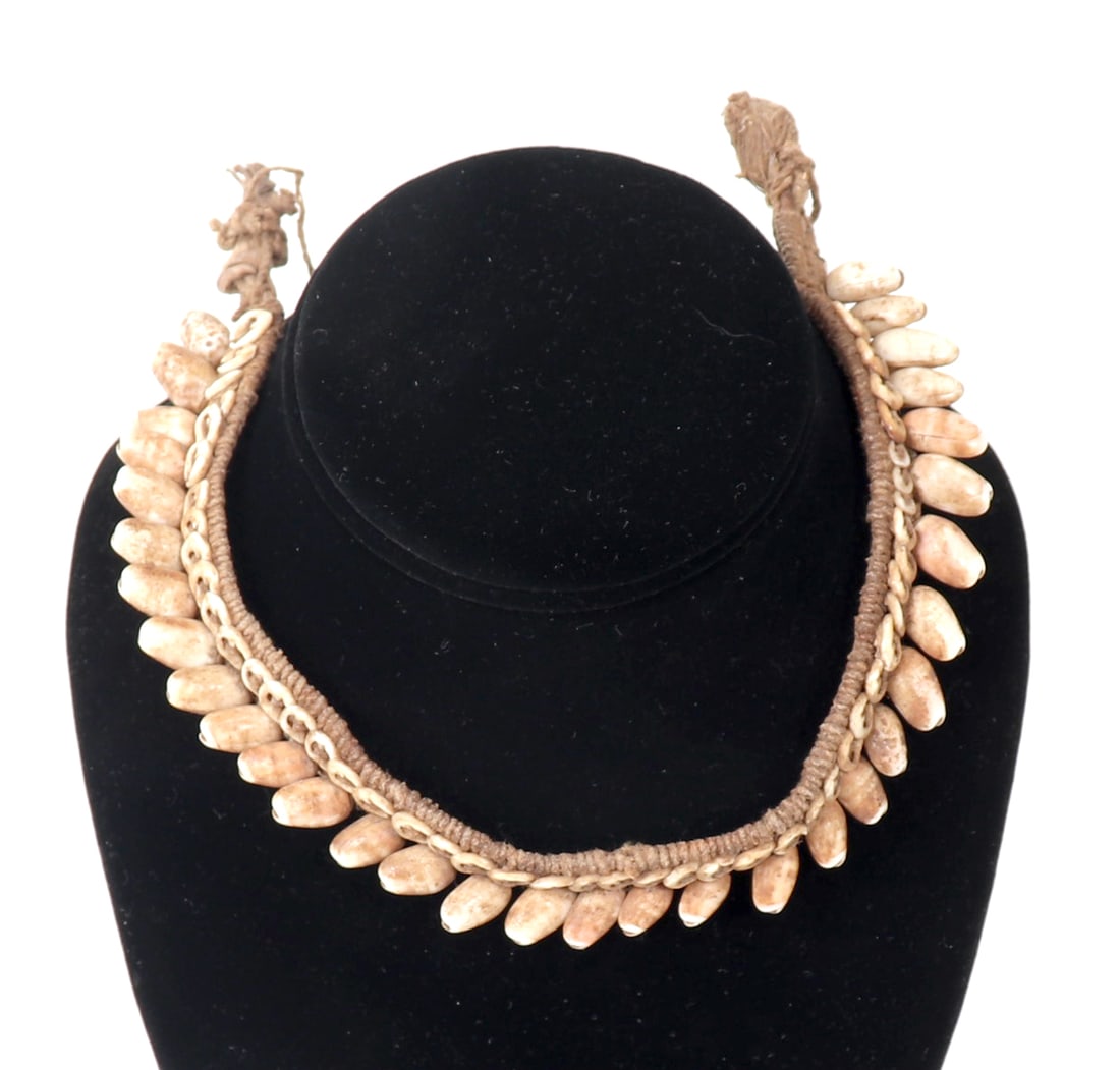 Papua New Guinea Shell Woven Choker: Lovely woven shell necklace from Papua New Guinea with dozens of repeating shells, woven tether with a knot slit for ease of putting on. Size 11 1/2" L approximately
