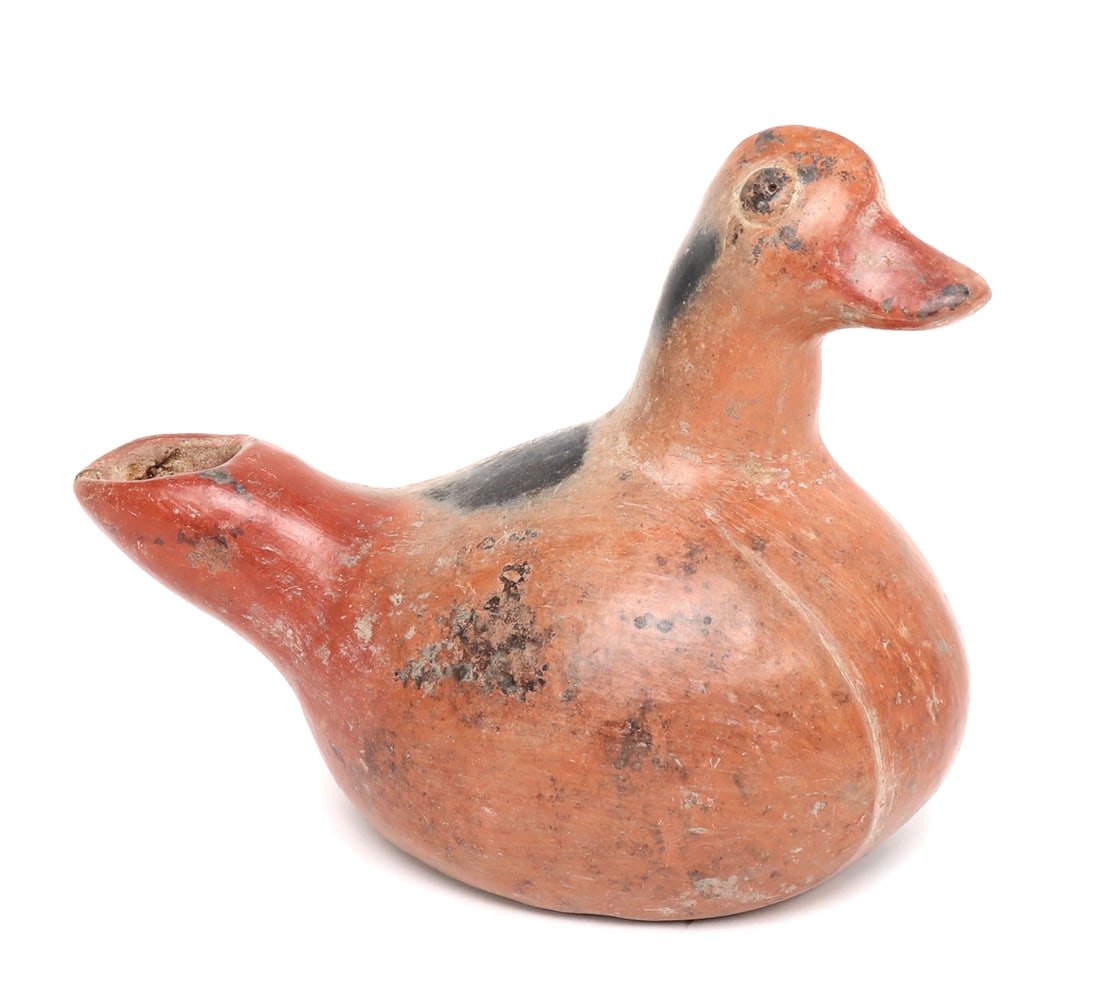 Colima Terracotta Duck Vessel, 300BCE - 300CE: Pre-Columbian, Colima Mexico, 300BCE - 300CE. Adorable and authentic terracotta redware duck with a orangish patination or pigment to the body surface with lightly molded wings and well formed beak. M