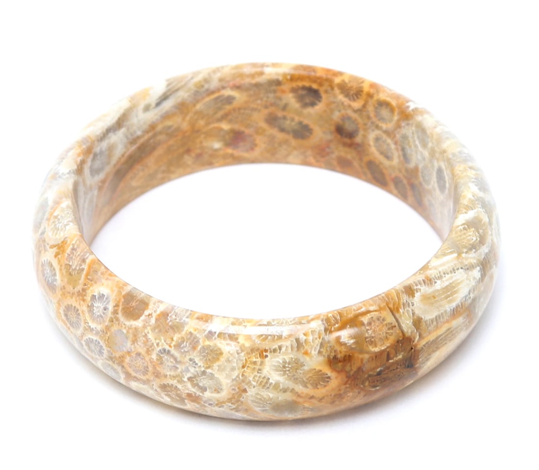 Lovely Polished Coral Bangle Bracelet: Finely polished section of cream colored coral with bursts of brown throughout. Size 2 5/8" W (inner width 2 1/8")
