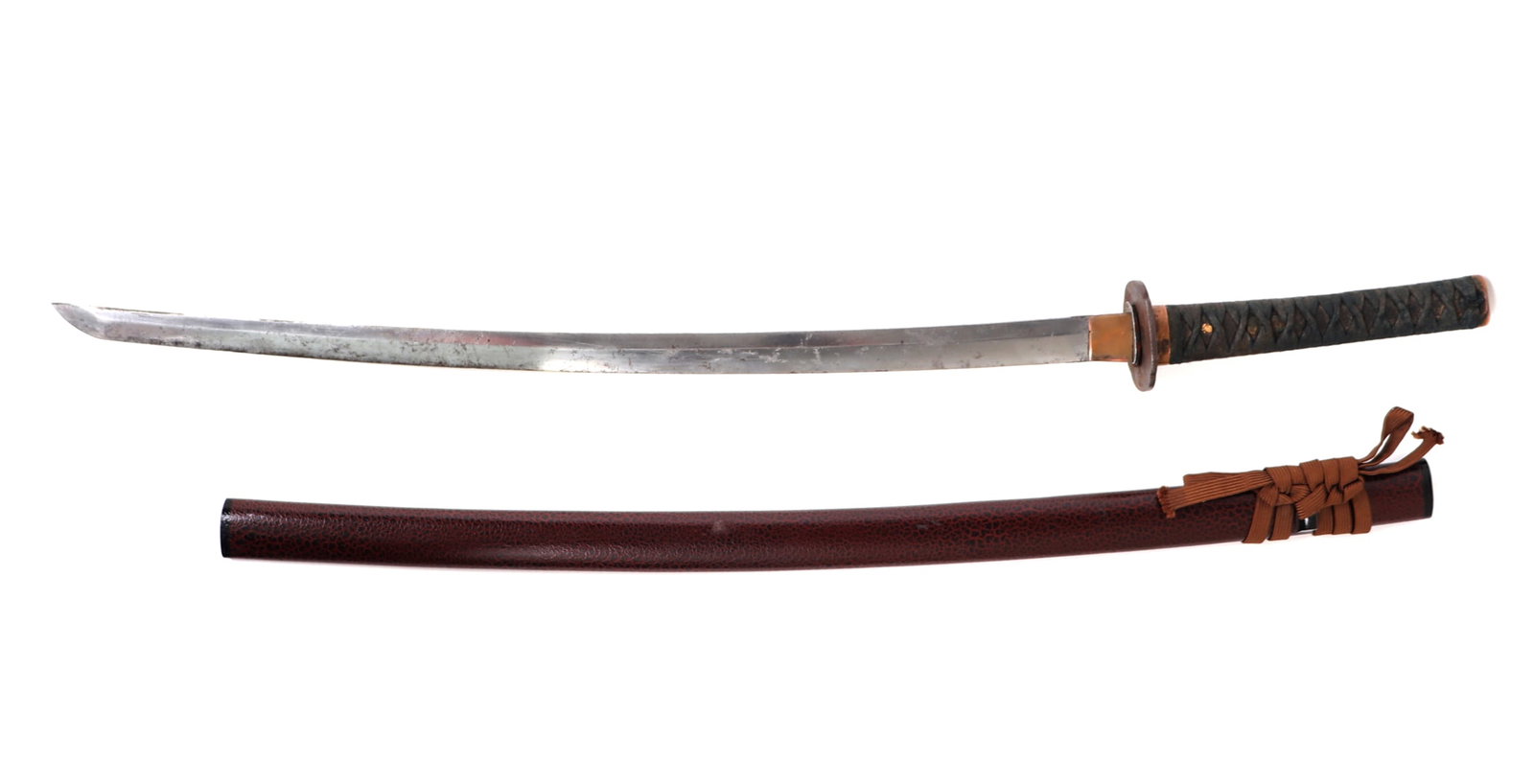 Old Japanese Katana w/ Scabbard: Old Japanese Katana with scabbard. Scabbard a red and black textured surface. Blade a single edge with old polish. Tsuba in iron with floral motifs. Size 40 1/4" L, blade 26 1/4" L Ex-Japanese Arms an