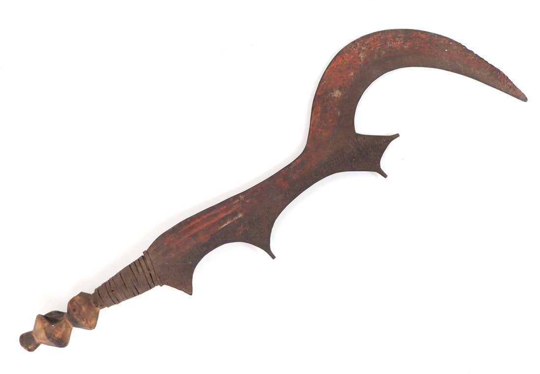 Congo Iron Executioners Sword w/ Pigment: Congo, Executioners sword known as a Ngulu with a multipronged blade and sickle like forward section. Red pigment applied to the edged side of the blade and textured surface to the reverse half. Light