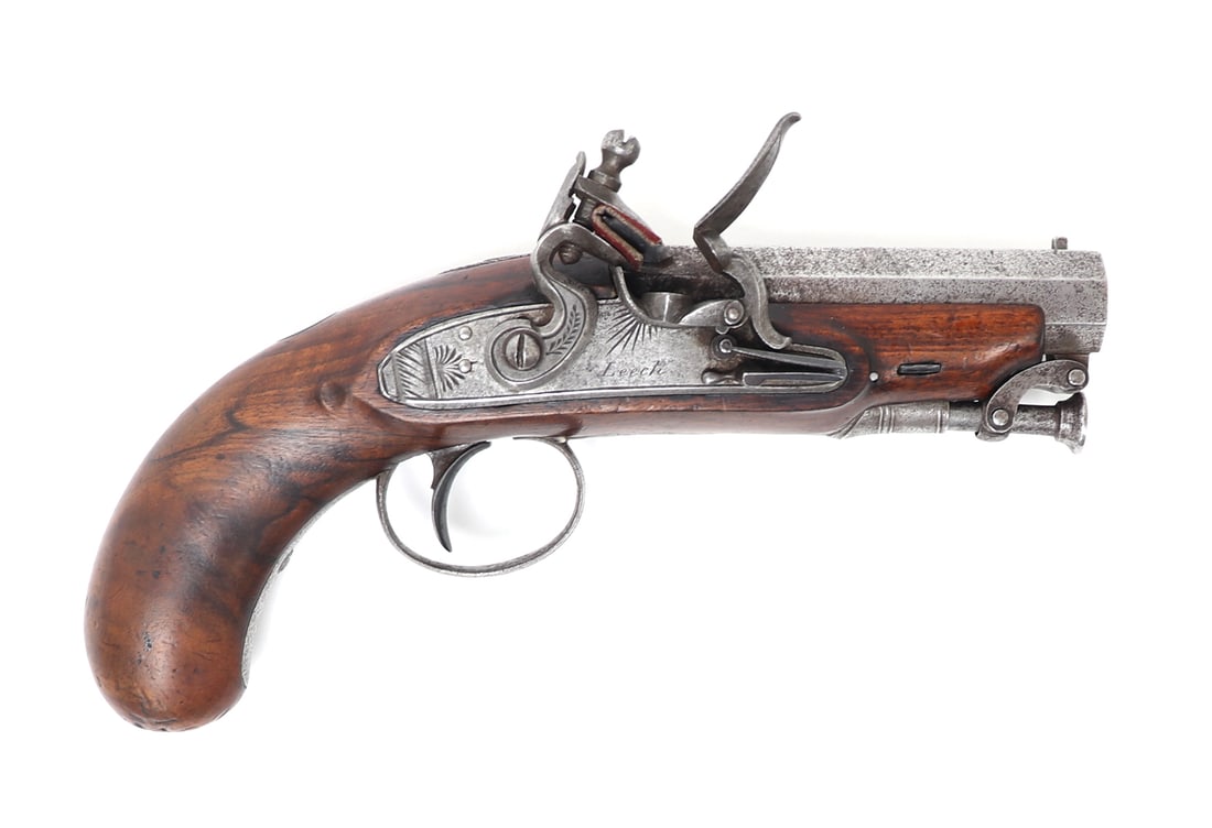 Irish Flintlock Overcoat Pistol, by Leech of Sligo: Fine Irish flintlock overcoat or traveling pistol with a dense grained wood stock in dark brown. Steel mounts and a hinged ramrod. Octagonal smooth bore barrel marked "SLIGO" Ireland with light engrav