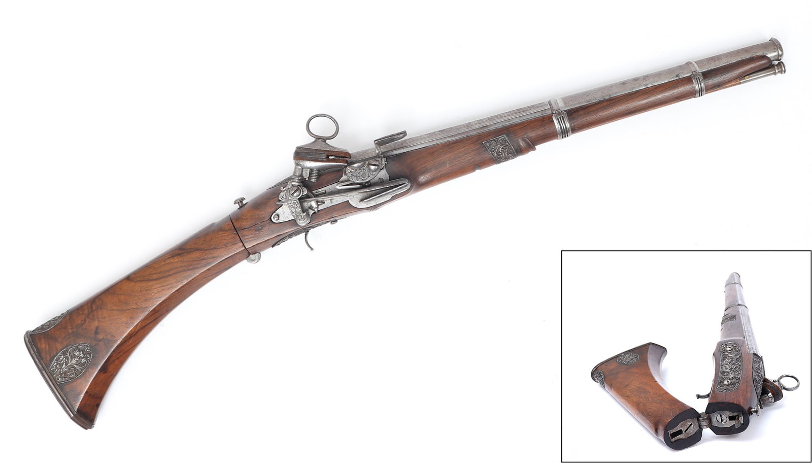 Spanish Chiseled Folding-Stock Flintlock Carbine, 18th C.: Excellent Spanish high art folding-stock miquelet flintlock carbine with Italian chiseled steel mounts in the manner of 1750. Barrel is 16 7/8" long and .69 caliber with octagonal breach, "wedding ban