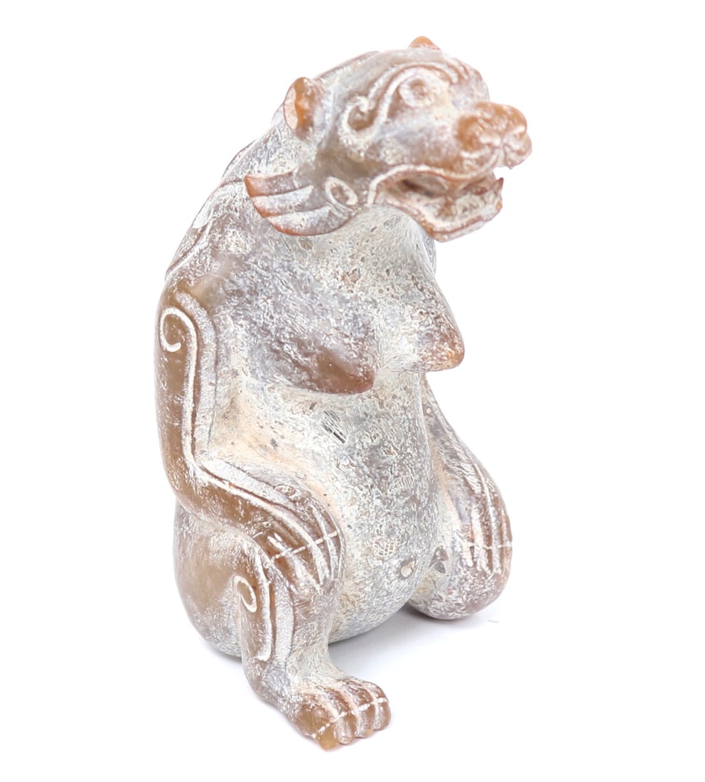 Chinese Hardstone Bear Carving, 533 grams: Chinese jade or hardstone zoomorphic carving probably of a bear or beast in a seated position. Carved orangish brown jade stone. Size 4 3/4" H x 3" W, 553 gramsEx-California Collection