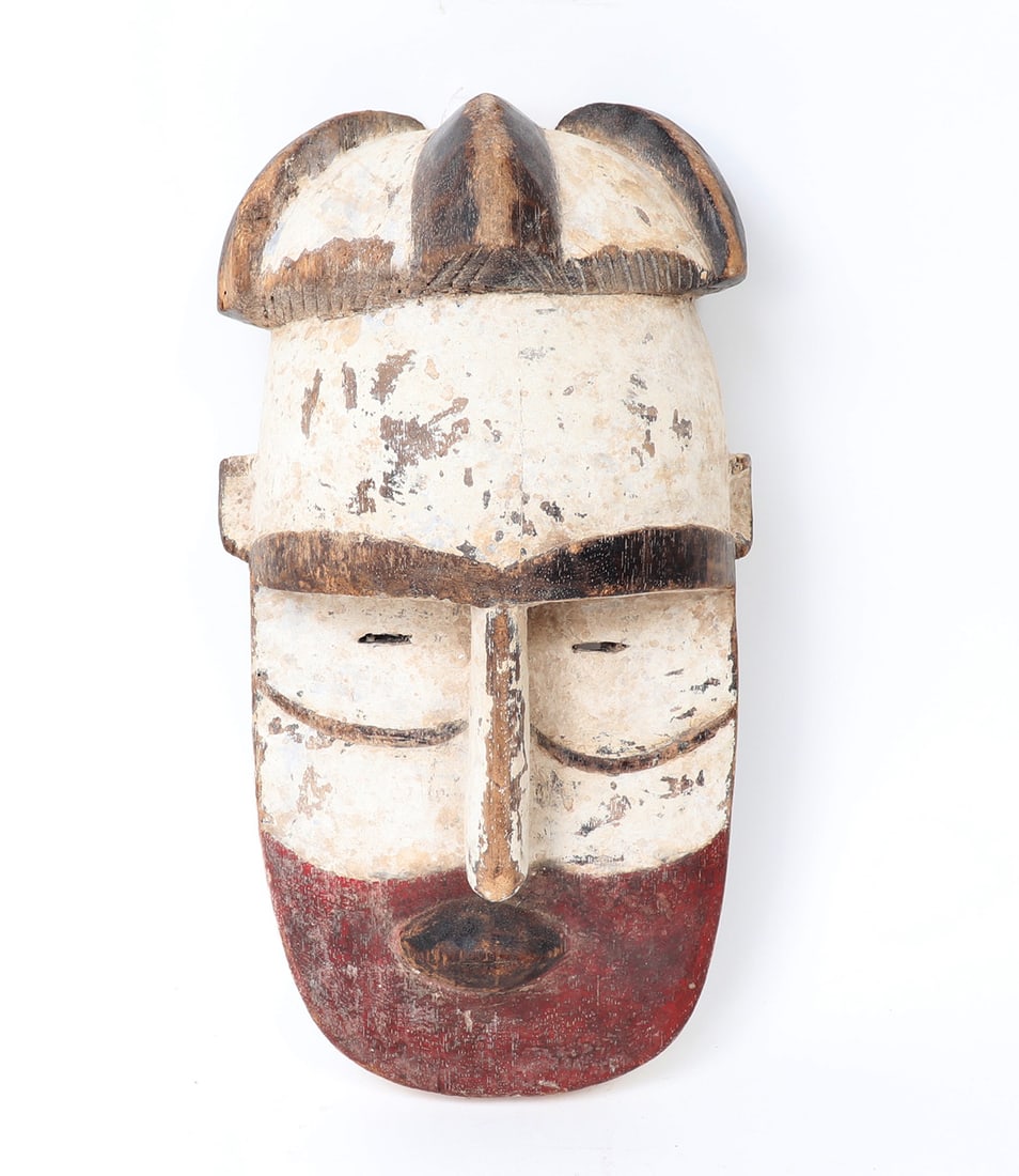 Adouma Peoples Mask, Gabon: Central Africa, Gabon, Adouma peoples carved and painted wood mask. Round red painted jaw and mouth with prominent nose and upper face in white with a deep brow. Used by the Adouma peoples as a dance