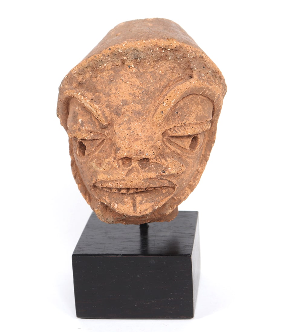Terra Cotta Male Nok Head, 1500 BCE-500 CE: West Africa, Nigeria, Nok Village / Religion, Nok head fragment made from terra cotta, portrayed with flared nostrils, and an open mouth suggesting the deep inspiration and exhalation associated with