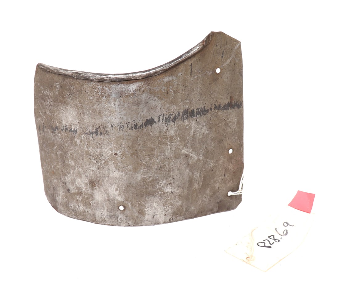 Reinforcing Plate of Armour, 16th-17th c.: Large element of armour for a breastplate or backplate, 16th - 17th century. Curved rolled edge to the top for an arm component. Higgins Museum Inv# (828.69). Size 6" HEx-Southern California Collectio