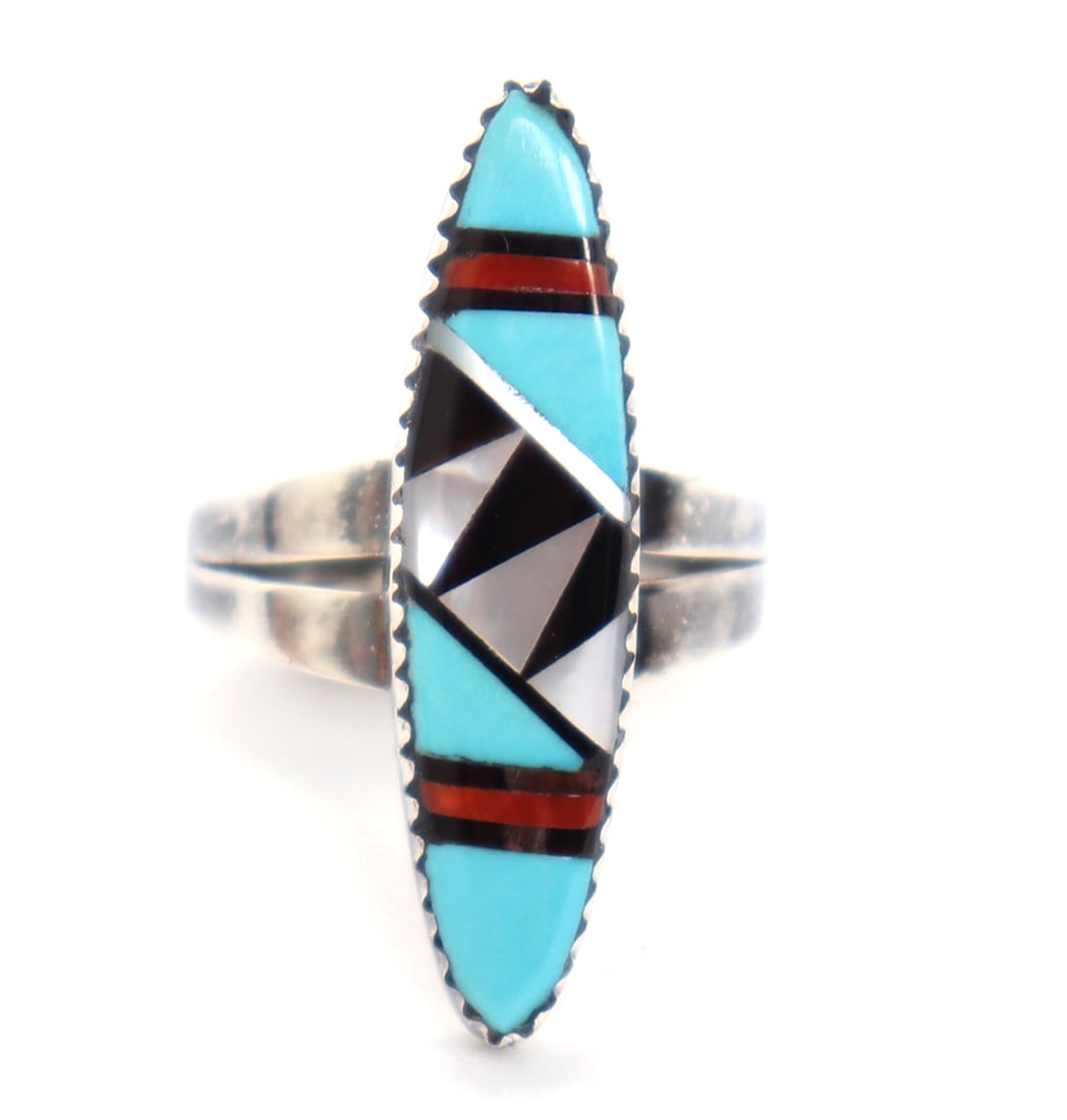 Native American Sterling Silver Ring, Signed: Lovely hand made Zuni Native American ring, comprised of turquoise, coral, jet and mother of pearl. Set in a scalloped bezel with a dual sterling silver band. Signed by the maker on the reverse in ham