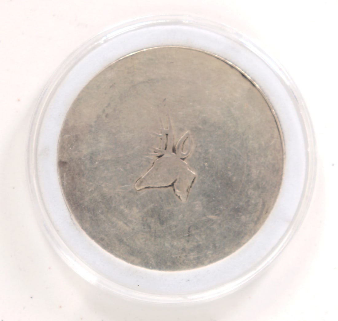 Cased Silver Style Coin: Possibly Islamic based on the text, this unusual coin has a stag or deer to one side and calligraphy to the other. Size 1 3/4" W **Please Note - Scollard Auctions is closed until Jan. 2nd 2025, winnin
