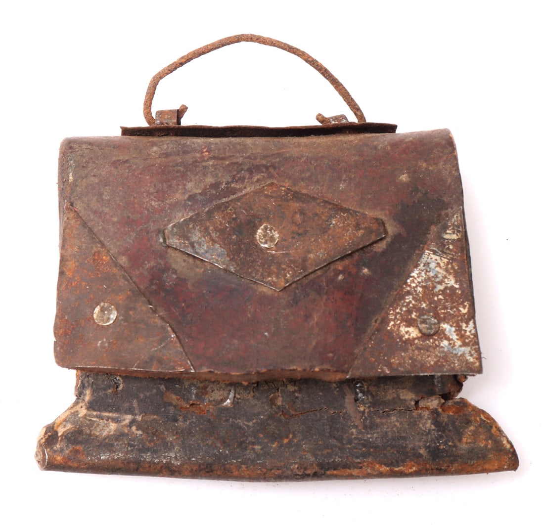 Tibetan Monks Chuckmuck: Early and heavily used antique chuckmuck with a single blade and yak leather flap. Heavily used in the region of Tibet in the 19th century. size 3" L x 3" W x 1/2" H weight 71gEx-Arizona Collection