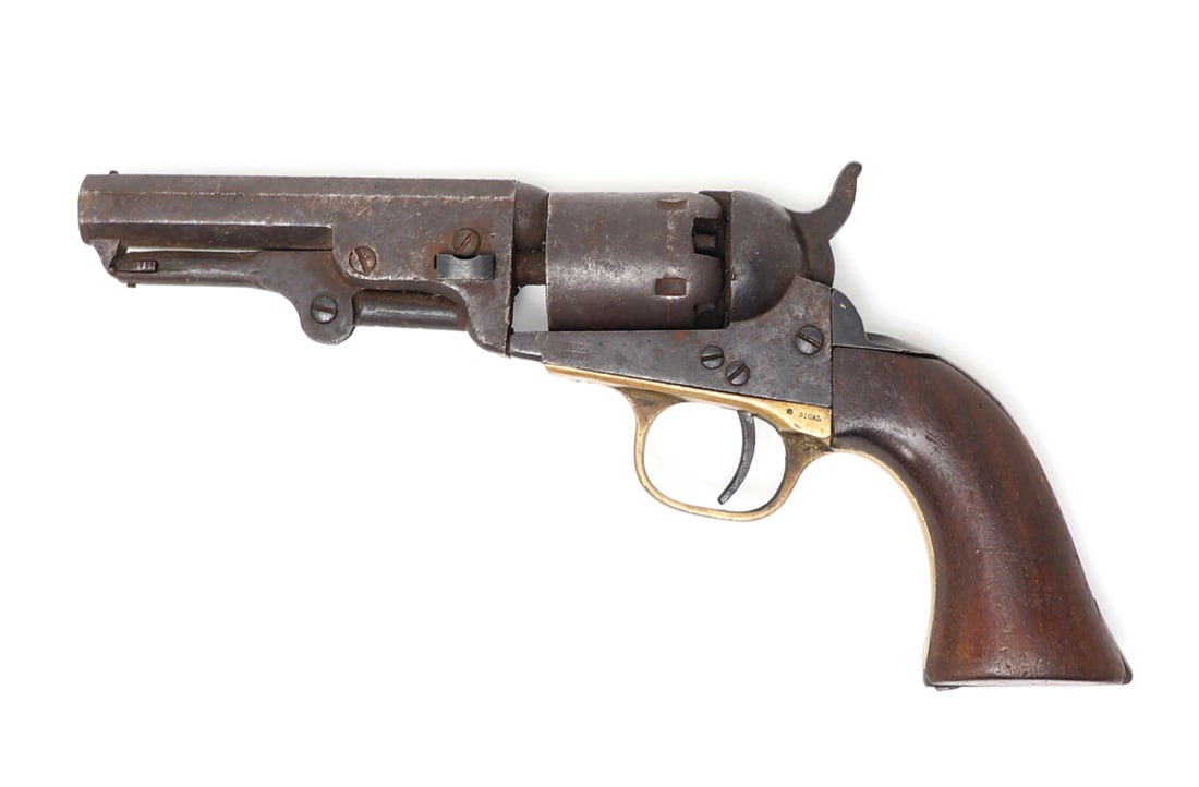 Colt 1849 Pocket .31 Pistol Revolver: American Colt manufacturing model 1849 pocket pistol revolver serial number (332392). Manufactured 1873. .31 Caliber with stagecoach scene on cylinder. Octagonal short barrel. Marked to the steel fram