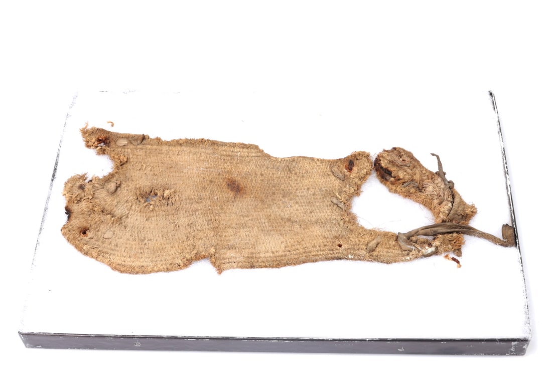 Anasazi Textile Sandal, 500-750CE (Inc. Ref. Book): Wonderful and rare authentic example of an Anasazi sandal, Basketmaker III Period 500-750CE. The included book and reference finds a nearly exact example as catalog number 98. The book states that san