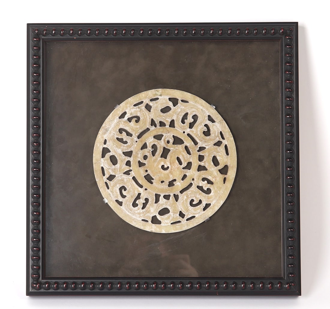 Mounted Chinese Pierce Work Disc: Carefully detailed hardstone pierced Chinese disc, with reptile or dragon like details throughout. Central image very similar to a Chinese Pixui with wings. Size 7 3/4" W, frame 15"W x 15" H