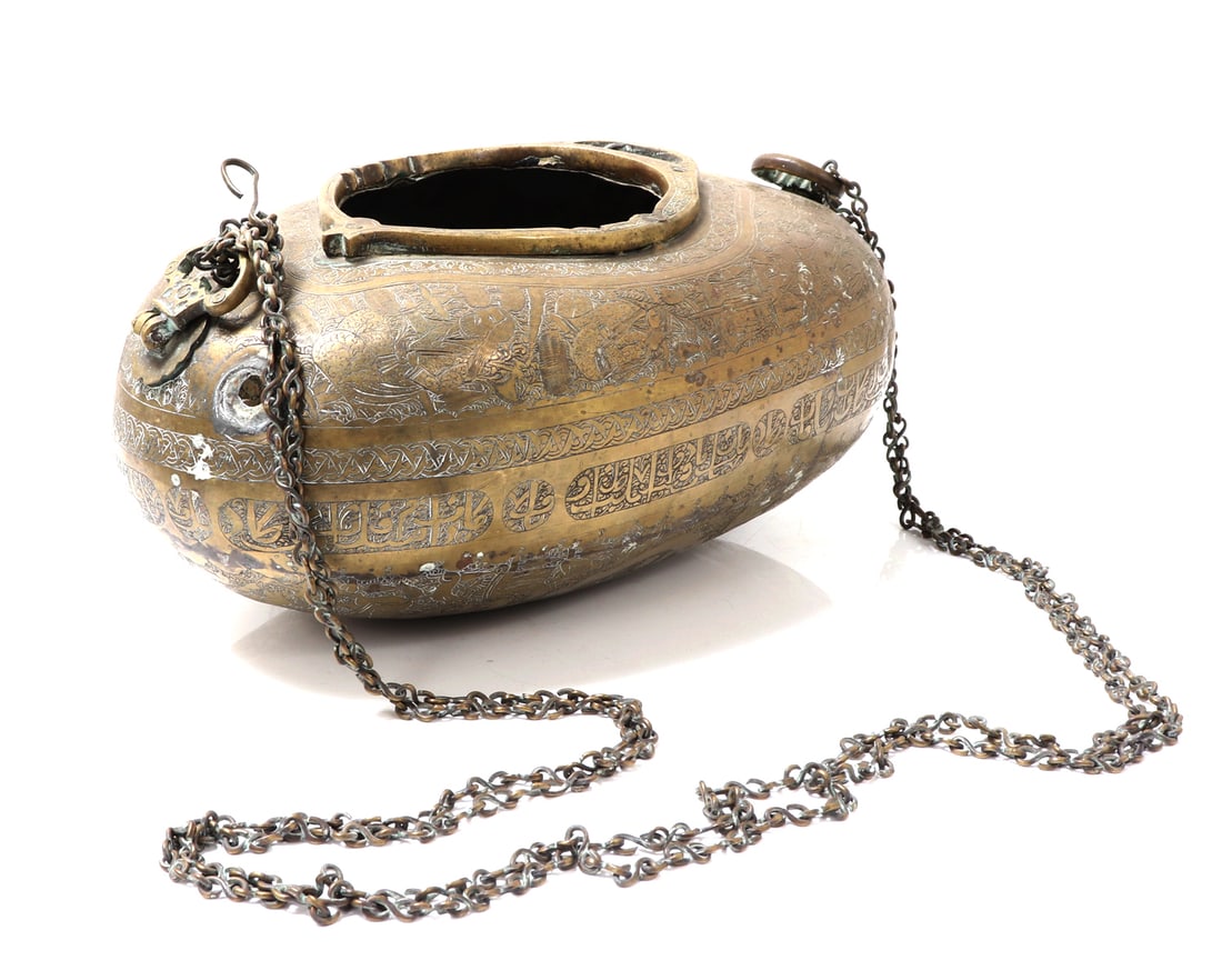 Lovely Brass Engraved Persian Kashkul, Late 19th Century: Beautifully detailed brass engraved Persian Kashkul, also known as a beggar's bowl we oftentimes carried and used as a container by wandering Dervishes and used to collect money and other goods includ