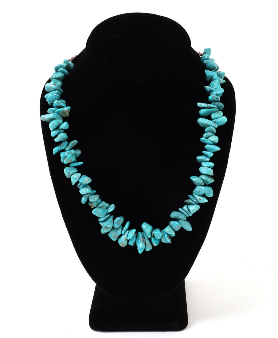 Lovely Natural Raw Chunky Turquoise Necklace: Very nice raw turquoise beaded necklace all tumbled and chunky in size with brilliant turquoise blue brilliance. Shell spacers beads at the clasp with silver tubes and a hook clasp. Size 19 3/4" L