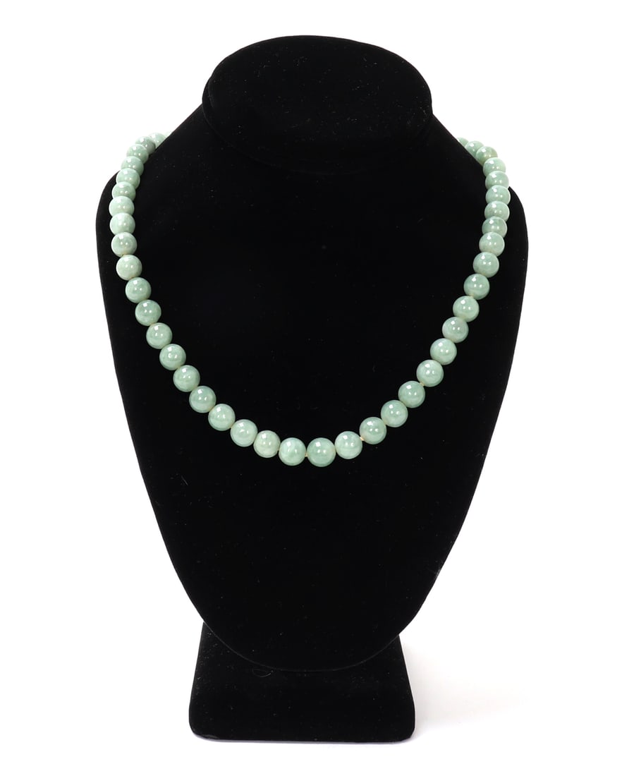Gorgeous Chinese Jade Necklace, 14k Gold: Lovely Chinese light green jade beaded necklace with a marked 14 carat gold clasp. All original and strung together with a dainty pink silk thread. Dozens of light green beads with beautiful cloud whi