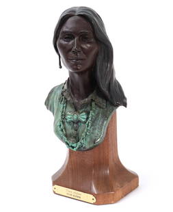 Bronze Bust by Susan Kliewer: Striking bronze bust by renowned sculptor Susan Kliewer captures the essence of Native American artistry presenting a realistic human portrayal and intricate detailing in jewelry and attire. Piece mou