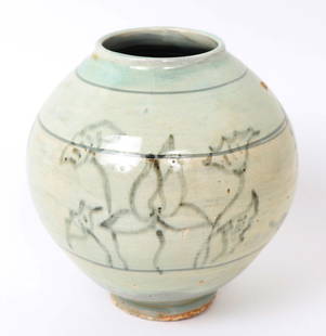 Gorgeous Korean Celadon Glazed Peach Shaped Jug: Late 19th century Korean porcelain crackle glazed vase in a unique turquoise green faded glaze. Painted with a light forest green details of blooming flowers and four bands around the body. Raised ung