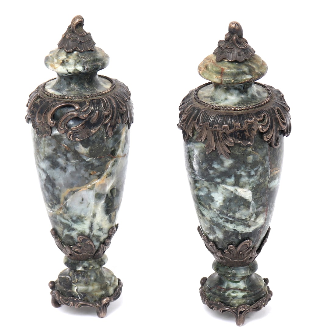 Green Marble Baluster Column: Dark speckles and marbled green stone carved in the form of a vase column with attached silver mounts in scrolling patterns of foliage. Size 8" H