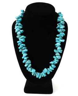 Beautiful Natural Turquoise Beaded Necklace: Lovely natural raw turquoise chunky beaded necklace, each bright cyan blue with natural earthen deposits and root marks throughout. Tiny shell spacer beads to the back in natural earth tones with