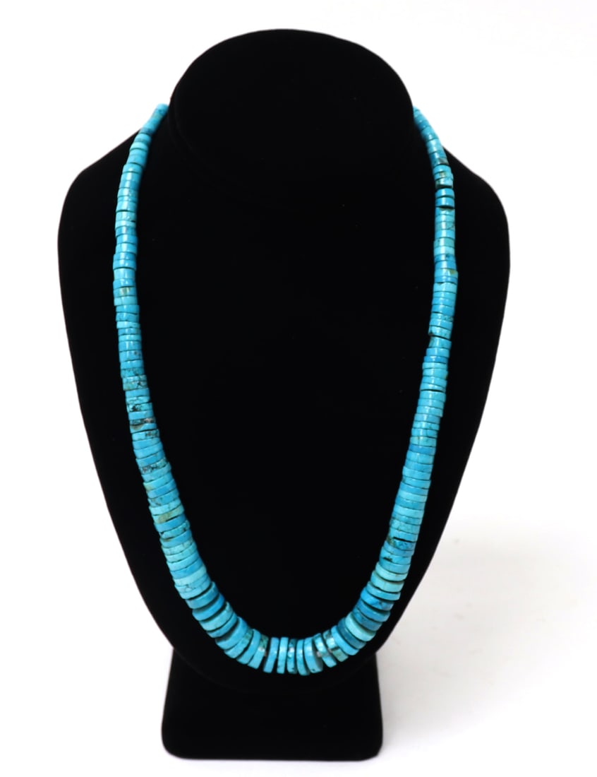 Lovely Turquoise Disc Bead Necklace: Dozens of perfectly cylindrical disc beads create this wonderful natural turquoise necklace. Bright blue marbling in each disc. Size 21" L