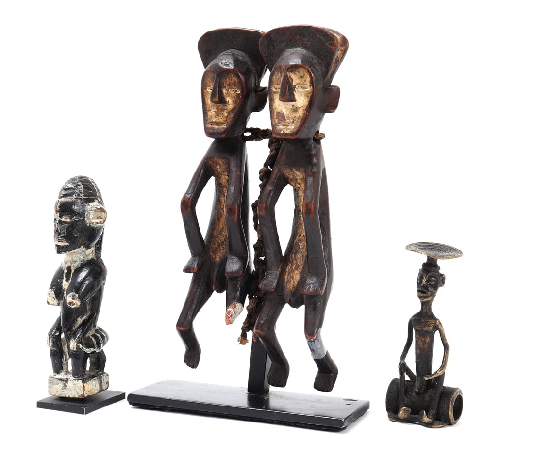 Group Lot of African Statues: Very nice group of African hand made statues comprised of stone, wood and bronze. First left most statue is of a seated woman on a throne, breasts exposed with hands on her lap. Center figure is a pai