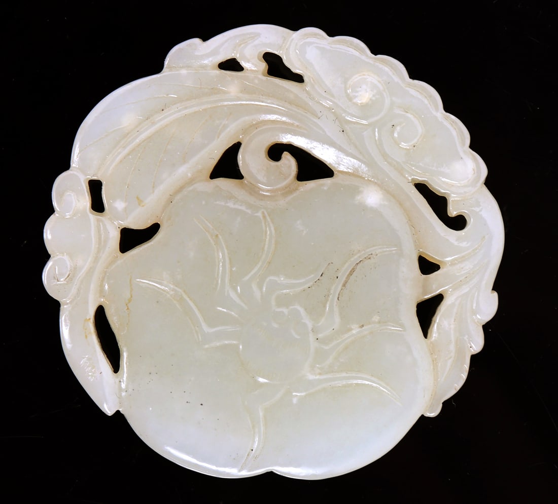 Lovely Chinese White Jade Ximu Plaque: Chinese white jade carved plaque, depicting a bulbous bodied spider on a piece of fruit with leaves and vines. With lovely open work design the piece could easily be suspended and used as a pendant. S