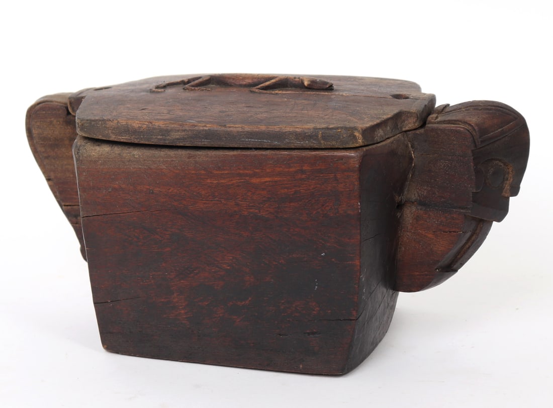 Indonesian Wood Carved Mortar w/Cover: Wonderfully carved Indonesian spice mortar with a securable lid. Lid includes a lizard in high relief, and two holes for securing to the base. One protruding anthropomorphic face to one side and tail 