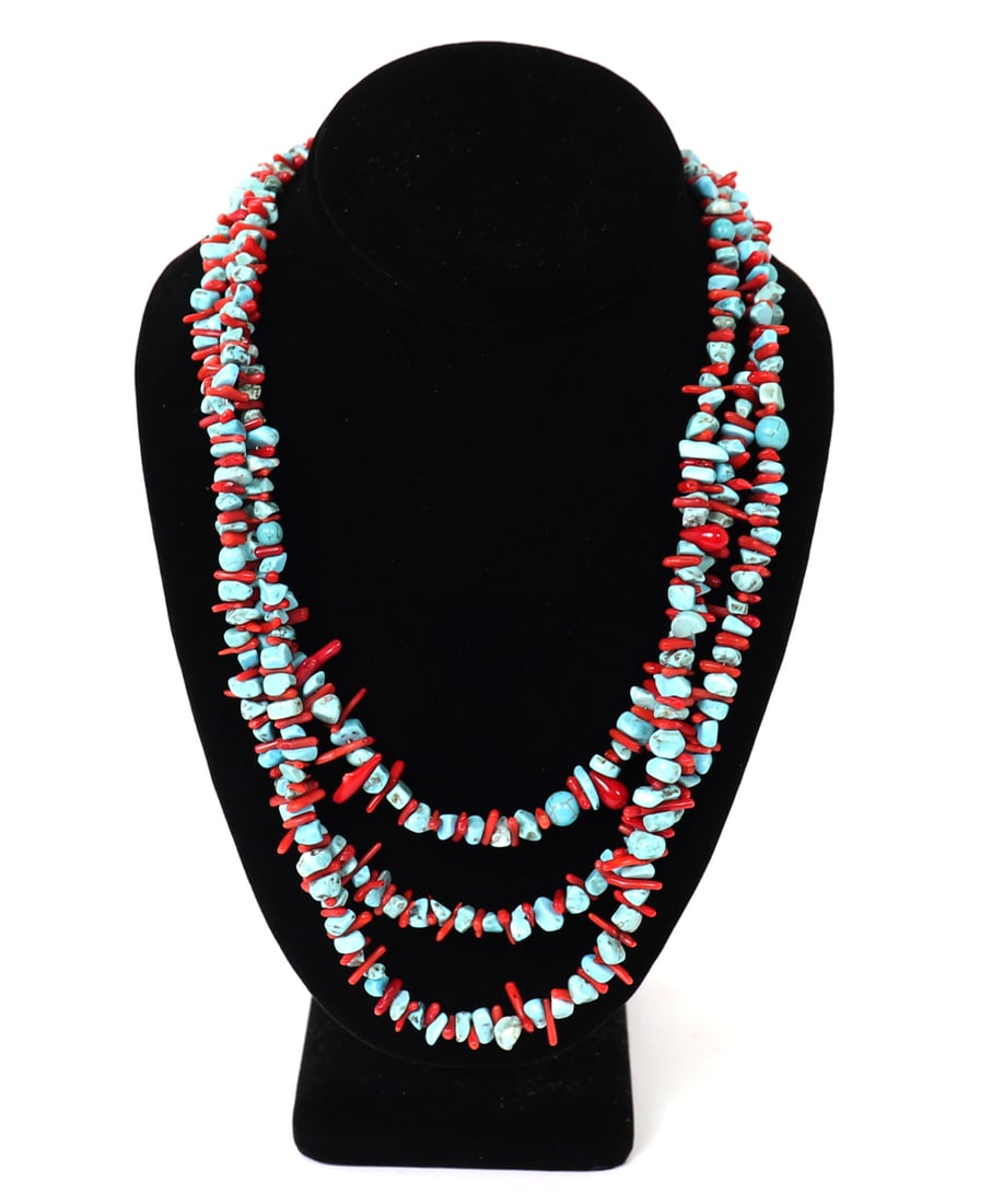 Turquoise & Coral Tripple Strand Necklace: Stunning hand crafted turquoise and bright red coral necklace with dozens of interchanging beads of each. Three strands in total with a classic sterling silver clasp. Size 18" L