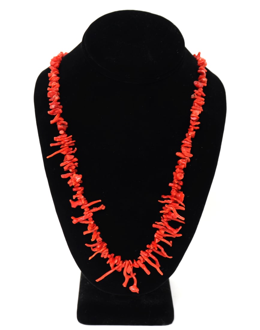 Lovely Bright Red Coral Necklace: Wonderful all natural necklace decorated throughout with dozens of bright red pieces of natural coral. Long pointed terminal coral pieces with shorter pieces in between. Size 25 3/4" L