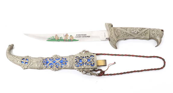 Custers Last Stand Commemorative Knife: Nicely made commemorative knife featuring Custers last stand. Bright blue metallic handle with metal overlay in intricate foliage design throughout. Size 12 1/4" L overall, blade 7 1/4" L