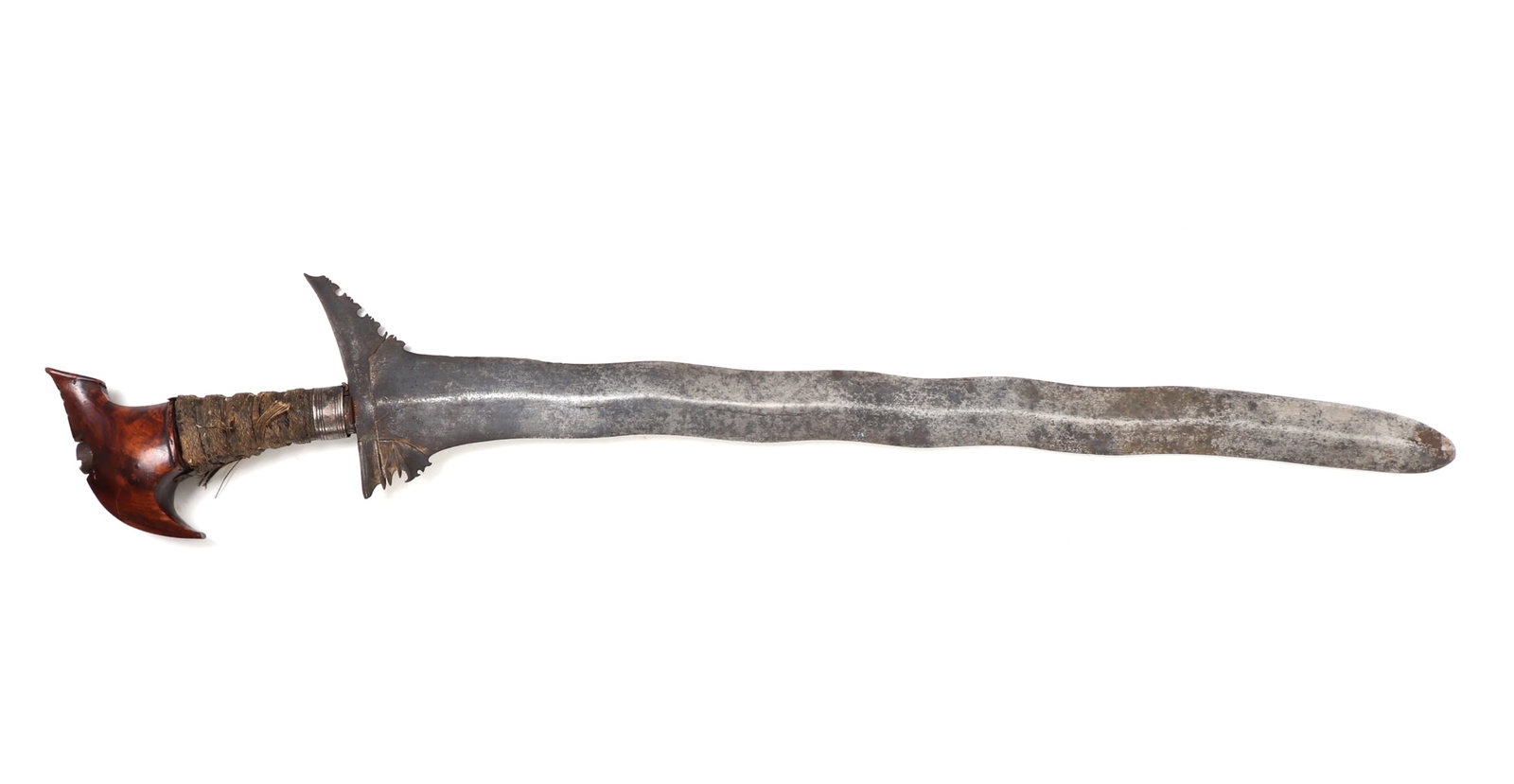 Moro Kris Sword: Philippines Archipelagos, Moro kris sword with 9-wave blade. Double edge blade with diamond cross-section and pierced and chiseled top section. Handle with silver fitting and woven resin sealed twine 