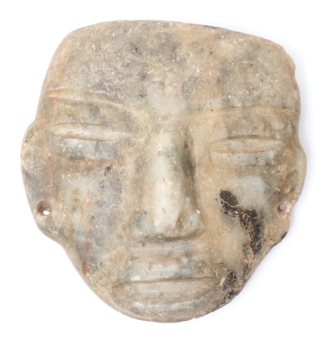 Mezcala Stone Mask, 700 BCE -200 CE: Pre-Columbian, Southern Mexico, Guerrero Region, late Mezcala culture 200 BCE - 650 CE. Beautiful mask in a white marbled stone with numerous indications of age and wear. Large nose, wide mouth, and e