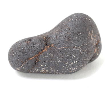 Fine Ancient Meteorite Specimen, 34 Grams: Ancient meteorite mineral specimen with lovely earthen deposits throughout. Well worn surface smooth with pitting throughout. Size 1 3/8" L, Weight 31 g